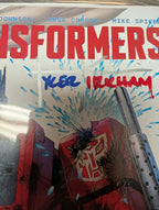 Transformers #10 Signed Tyler Kirkham MegaCon 2026 Exclusive Battle Damaged Trade Dress Variant – Image Comics