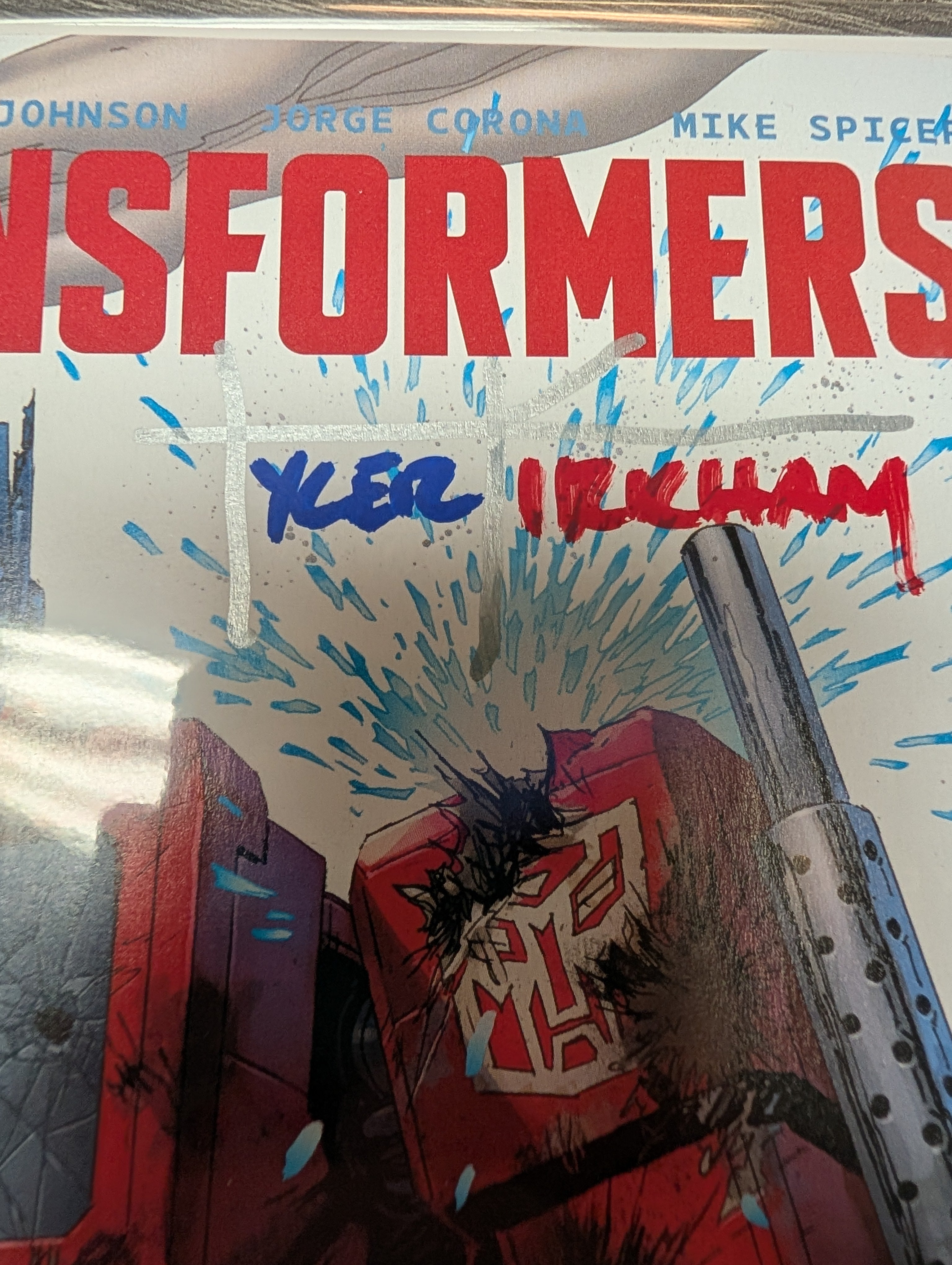 Transformers #10 Signed Tyler Kirkham MegaCon 2026 Exclusive Battle Damaged Trade Dress Variant – Image Comics